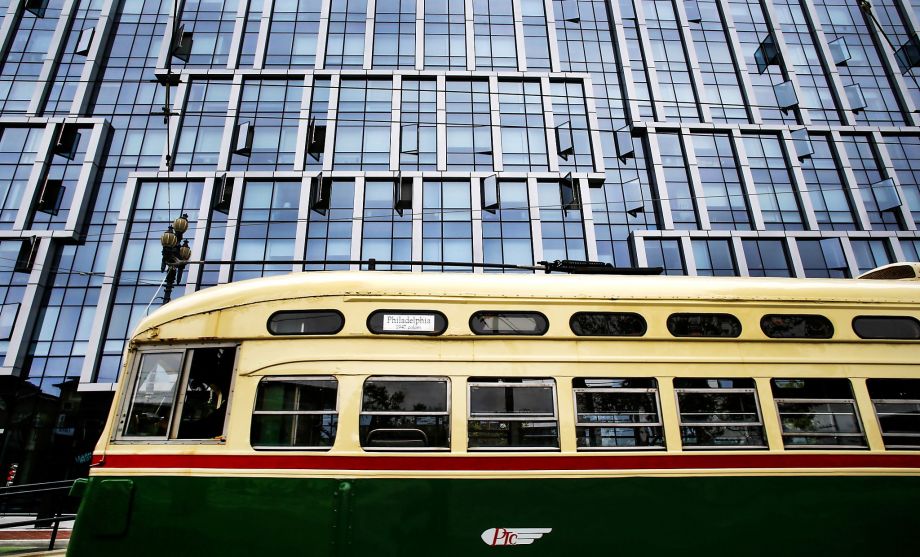 Streetcar No. 1055, wearing its original 1946 Philadelphia livery, passes new condos on Market at Buchanan. Michael Macor photo for the Chronicle.