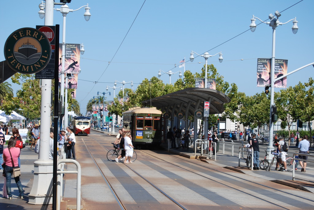 New Orleans "Streetcar Named Desire" No. 152 (built 1924) operates in demonstration E-Embarcadero service along with PCC No. 1007 during the 2008 Sunday Streets event.