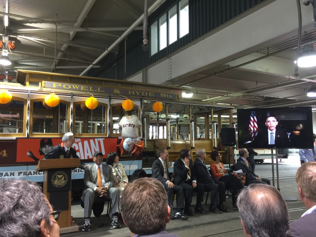 President Obama speaks via video at the dedication of cable car 24 to Willie Mays.