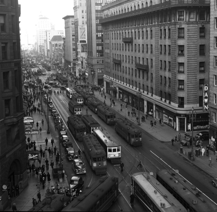 In this 1940 shot from the SFMTA Archives, you can see automobiles jousting with streetcars for space on Market Street. This car-car clash was a big reason streetcars almost died out in the U.S.